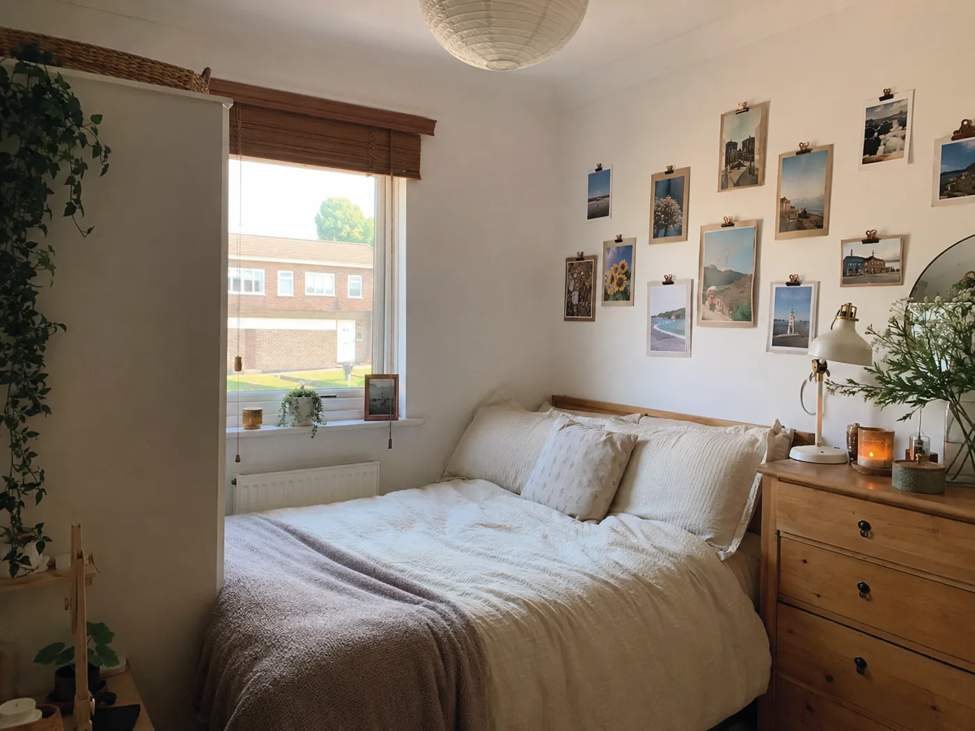 Clip frame gallery wall with printed photos and postcards